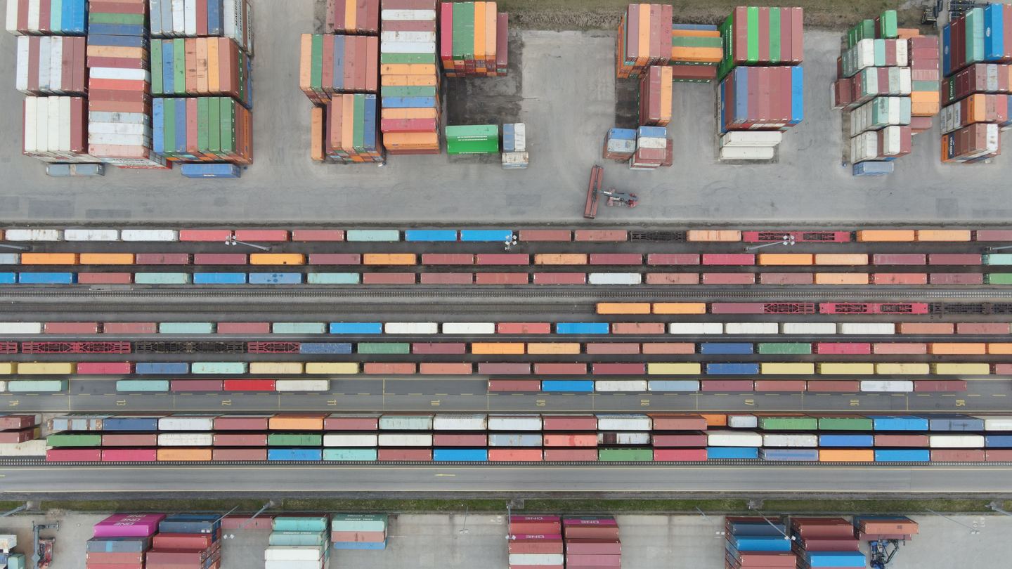 Freight containers arranged in rows across a distribution yard